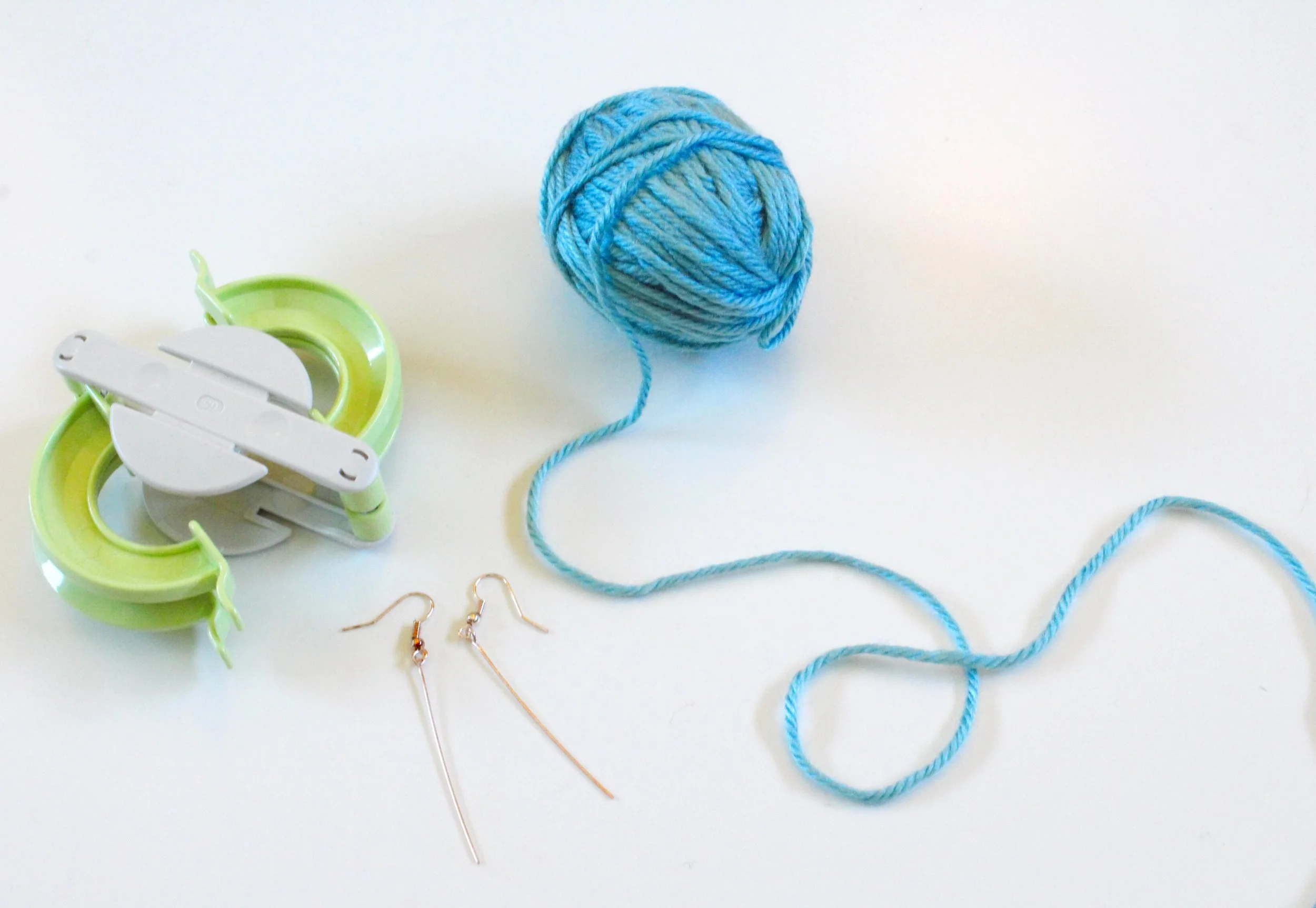 Clover Pom Pom Maker, Sky Blue Yarn and Earring Findings. 