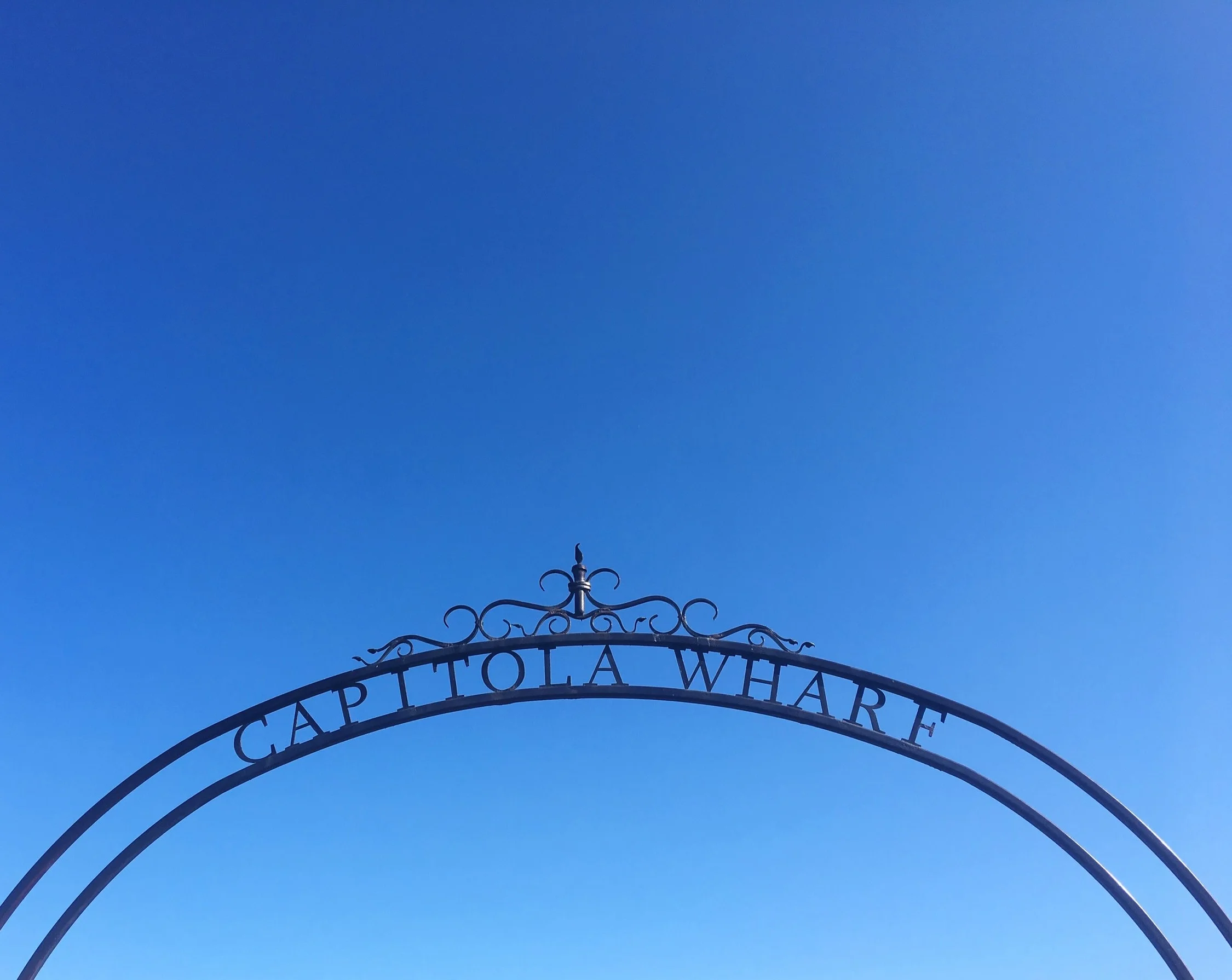 Capitola Wharf Arch and Blue Skies. 