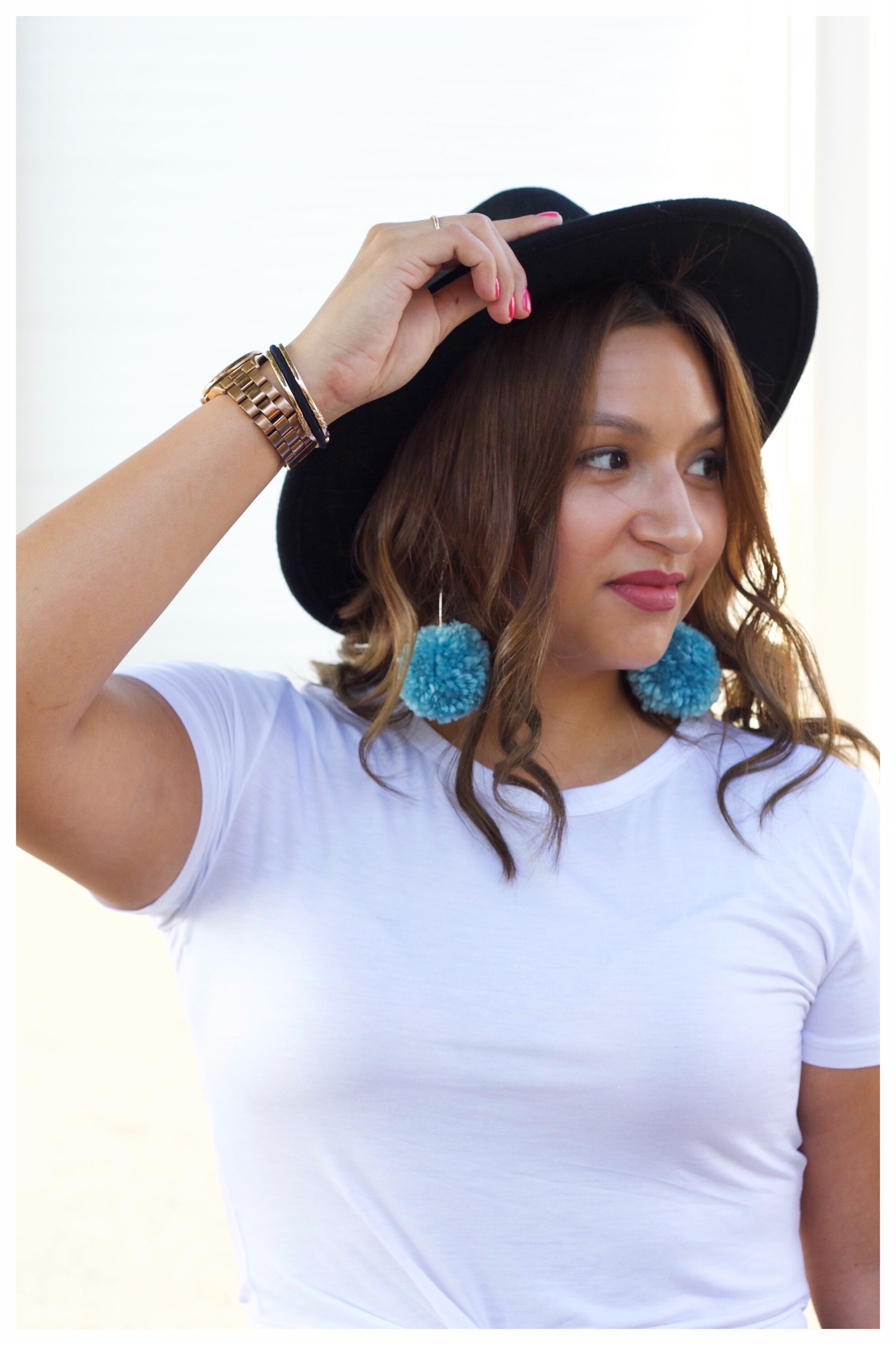 Blue Pom Pom Earrings and Gold Accessories 