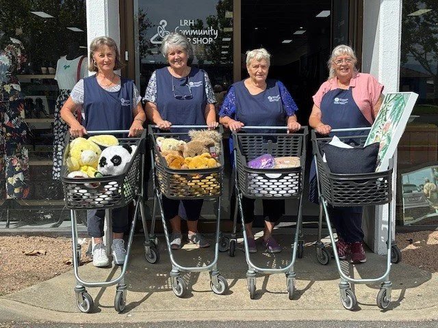 LRH staff pose with donated supercart trolleys