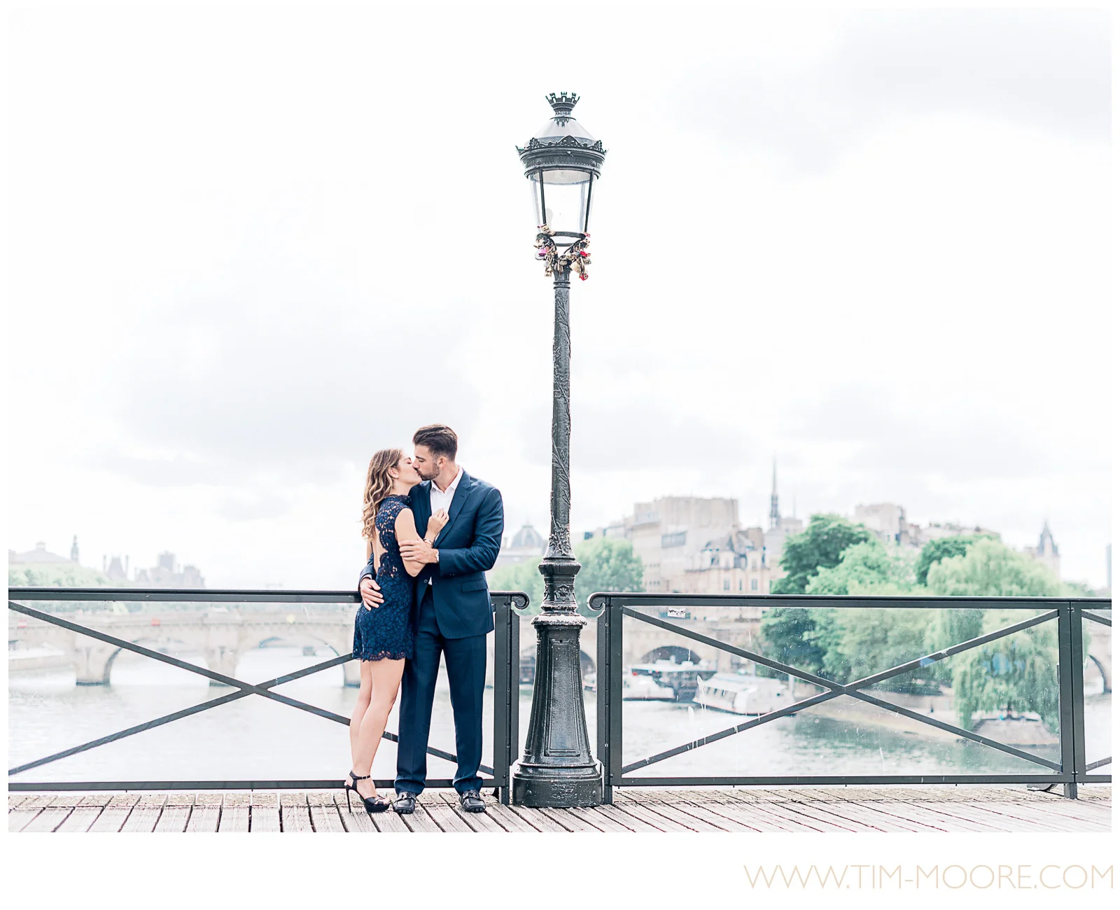 Paris photographer Tim Moore - Rosy and Kenny enjoying spring time just after she said Yes during their Paris proposal photo shoot