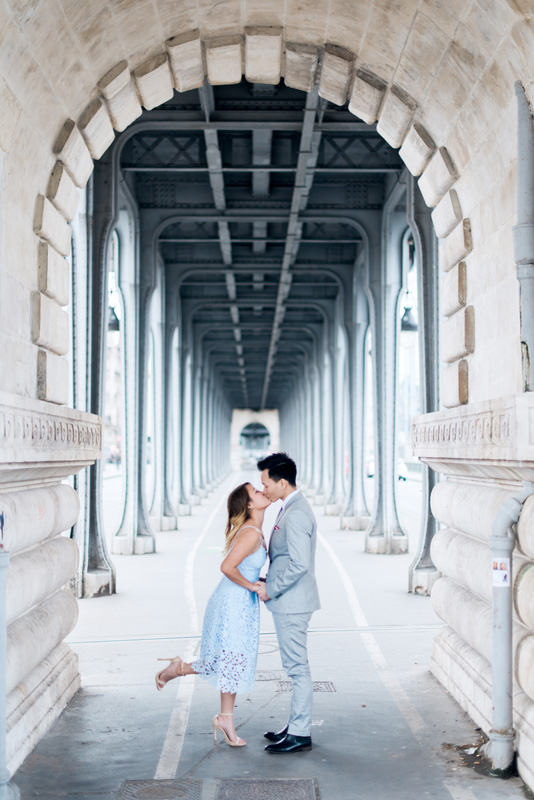 paris photographer - engagement photo shoot on a parisian bridge