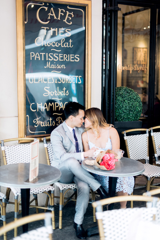 paris engagement photographer - photo shoot in a cute little parisian cafe