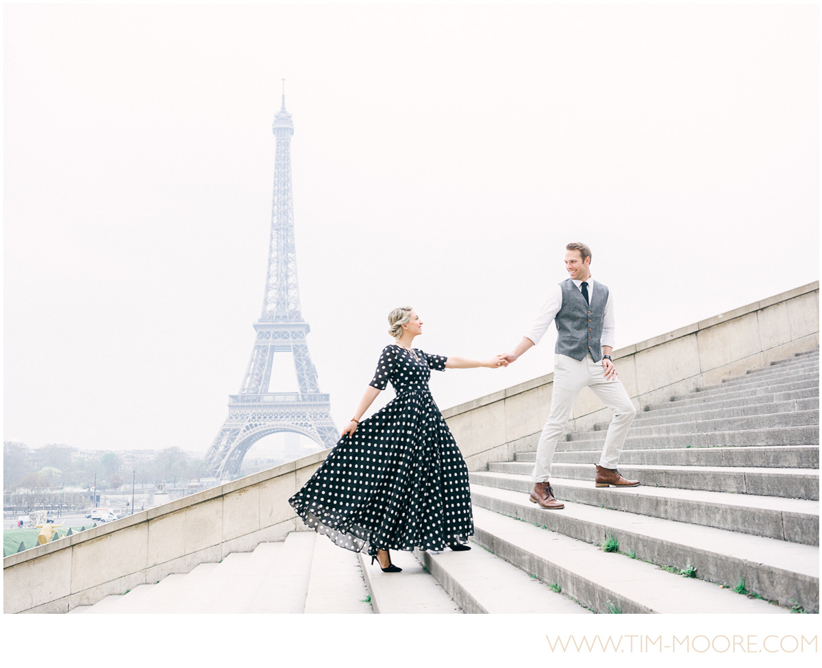 Paris Photographer - Couple photo shoot at the Eiffel Tower early in the morning in Paris, walking up the Trocadéro stairs together