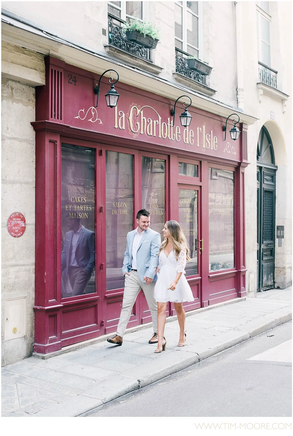Paris Photographer - Engagement photo shoot in Paris wandering in an authentic Parisian neighborhood