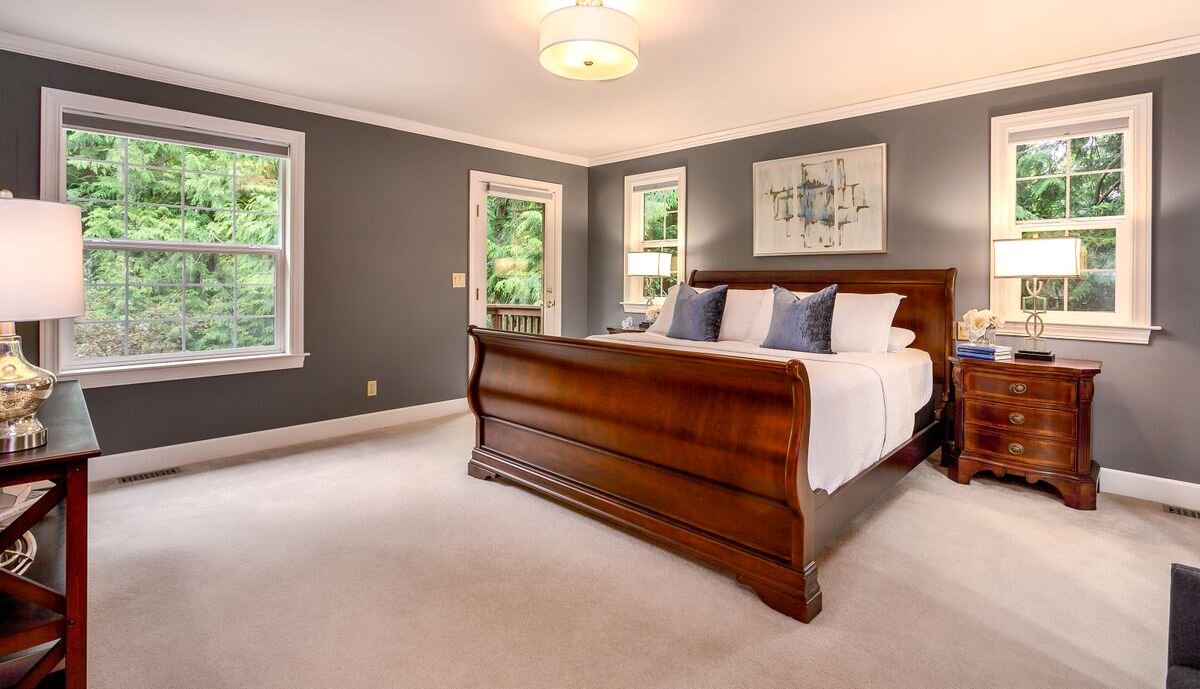  A tranquil night’s rest awaits you in this lovely master suite that overlooks the backyard and enjoys its own balcony, an adjoining bath, and two separate walk-in closets. 
