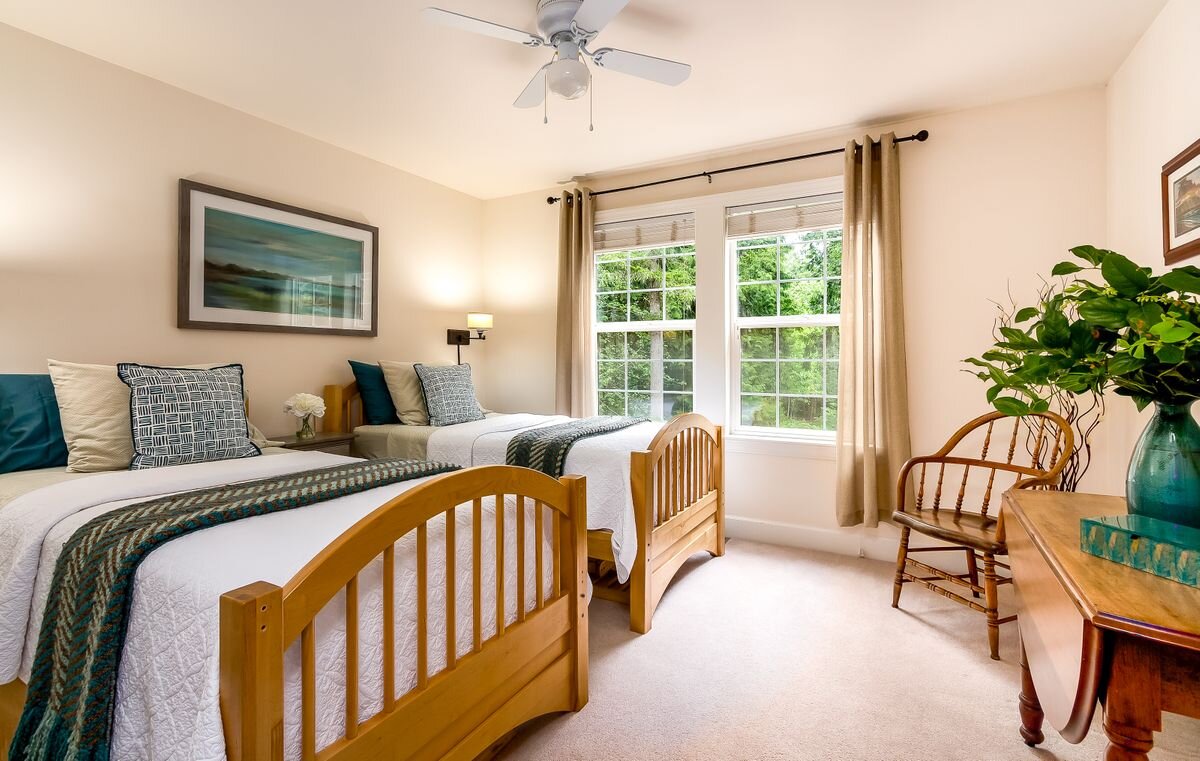 This large bedroom overlooks the backyard and is nicely located across from the other larger bedroom and the 'homework nook'. 