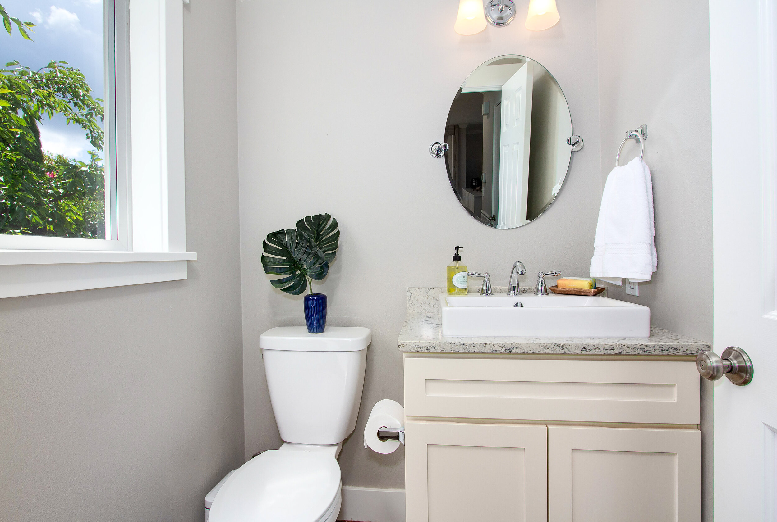  An updated half bath is perfect for guests’ needs during a visit.&nbsp; 