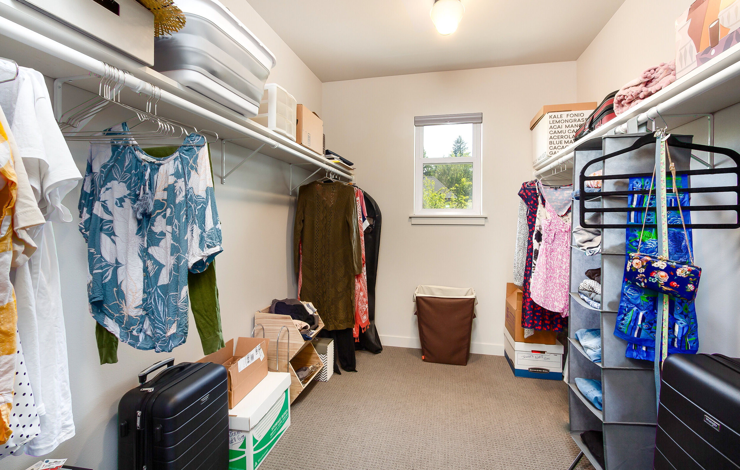 The spacious walk-in closet, located in the master, provides plenty of space for all of your belongings. 