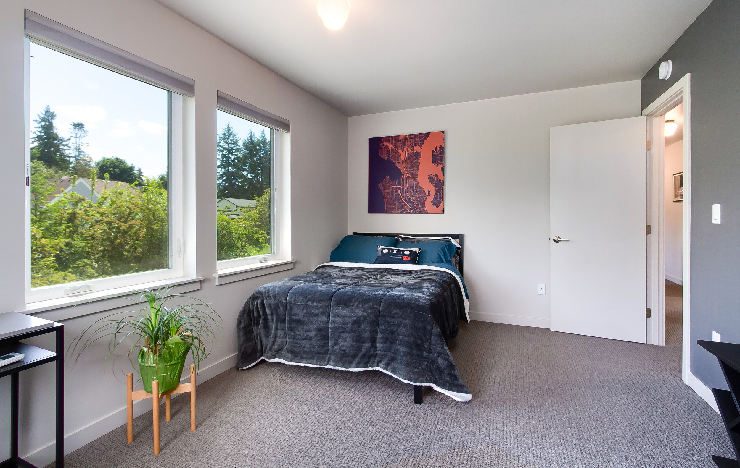 The second and third bedroom on the main floor offer plenty of space and natural light. 