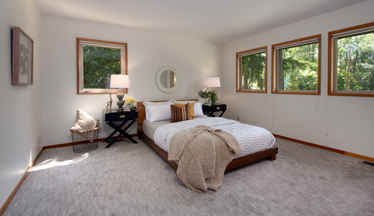 The large master bedroom is a peaceful oasis, filled with generous natural light and accompanied by an en suite bath.  