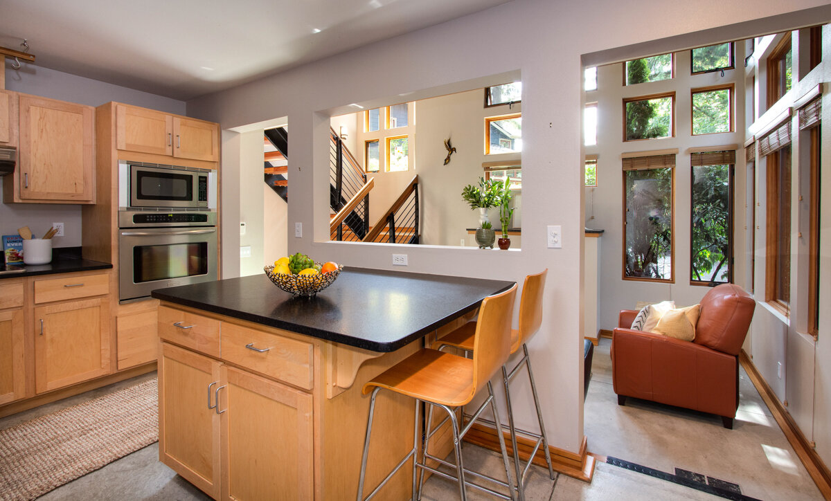 The large, open kitchen centers around an eat-up island with space for two.