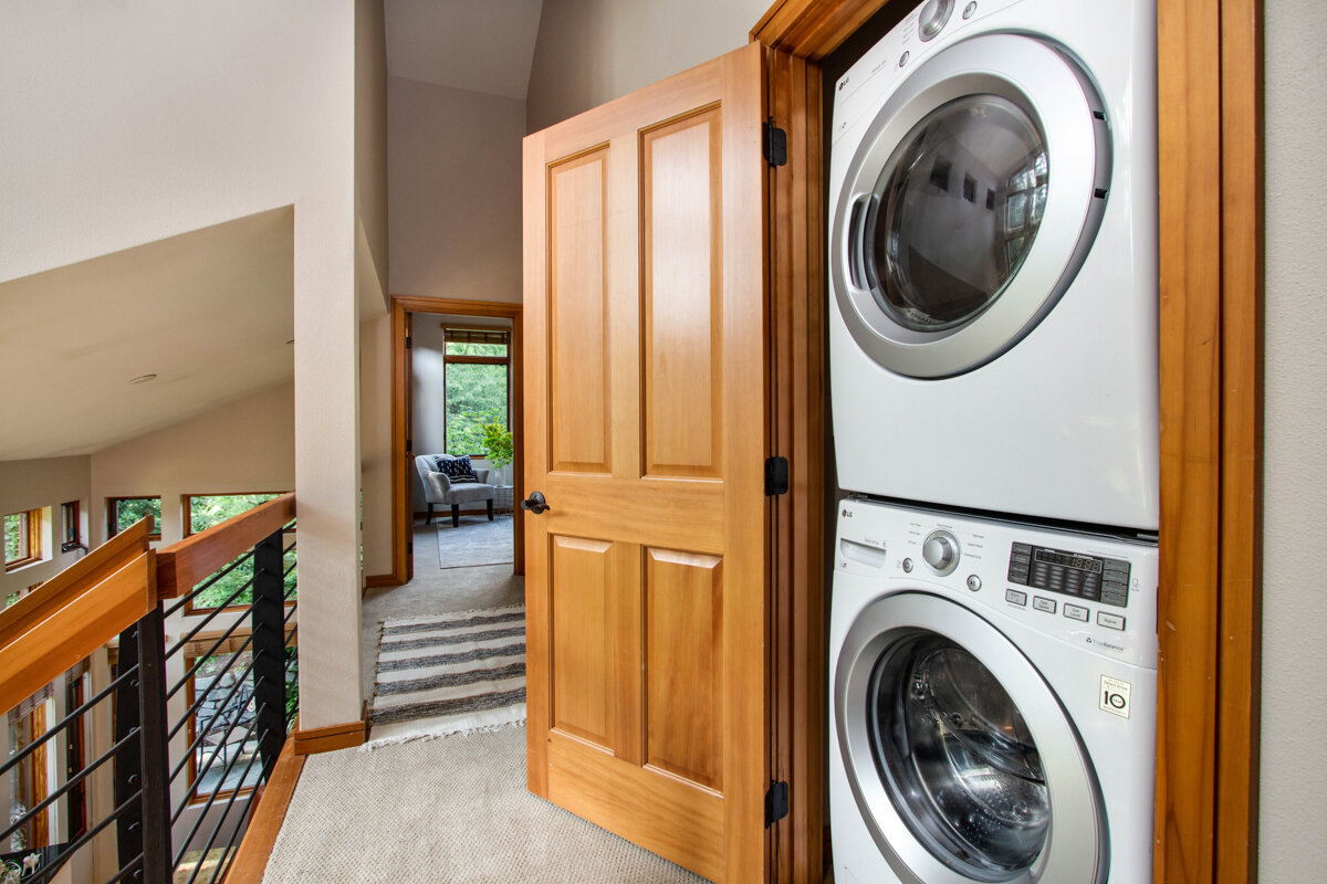 A stacked washer/dryer set offers the convenience of in-home laundry without taking up precious floor space.