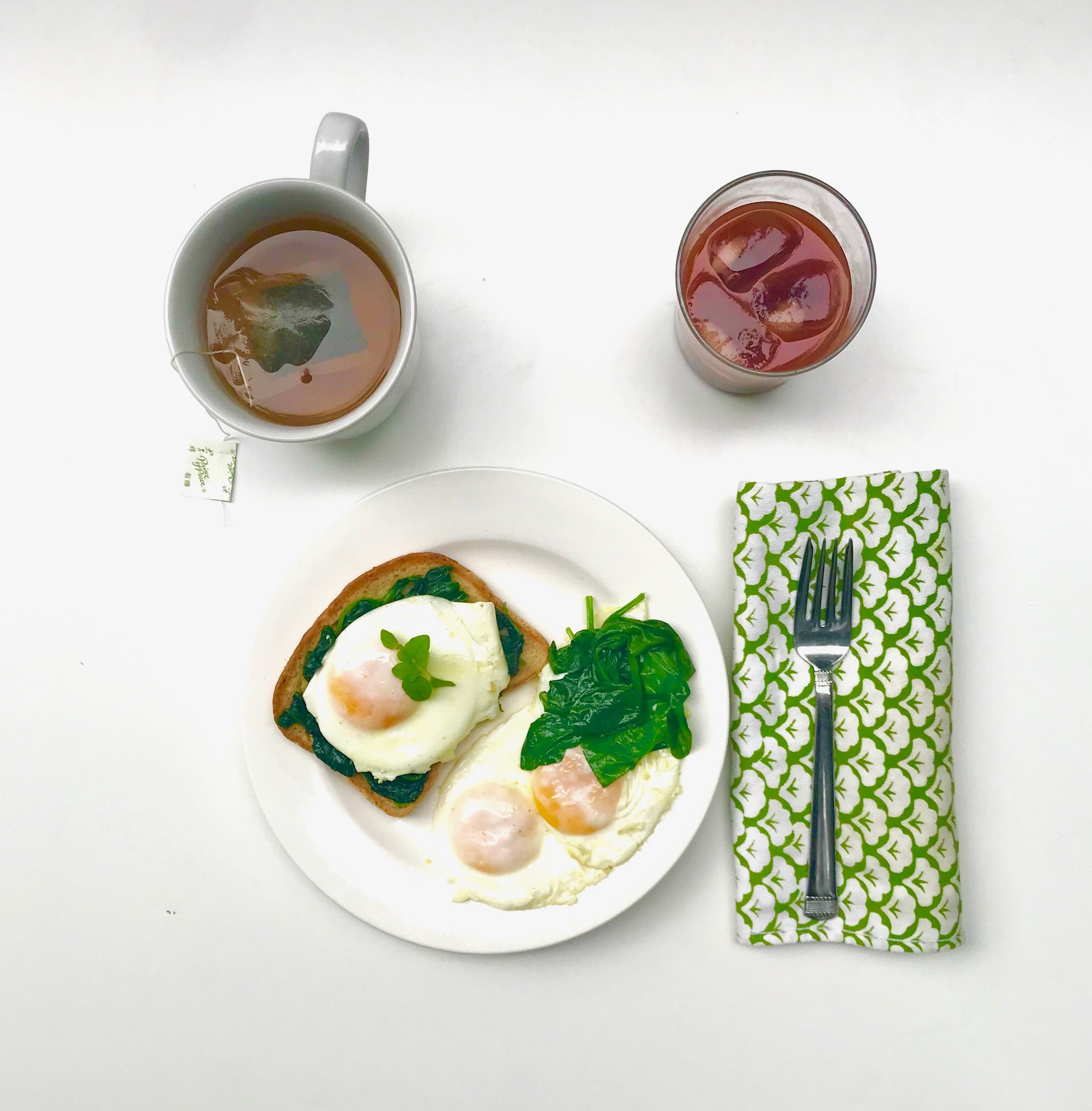 My Ideal Breakfast = Sauteed spinach, gluten free toast, perfect eggs, green tea, NingXia Red juice.