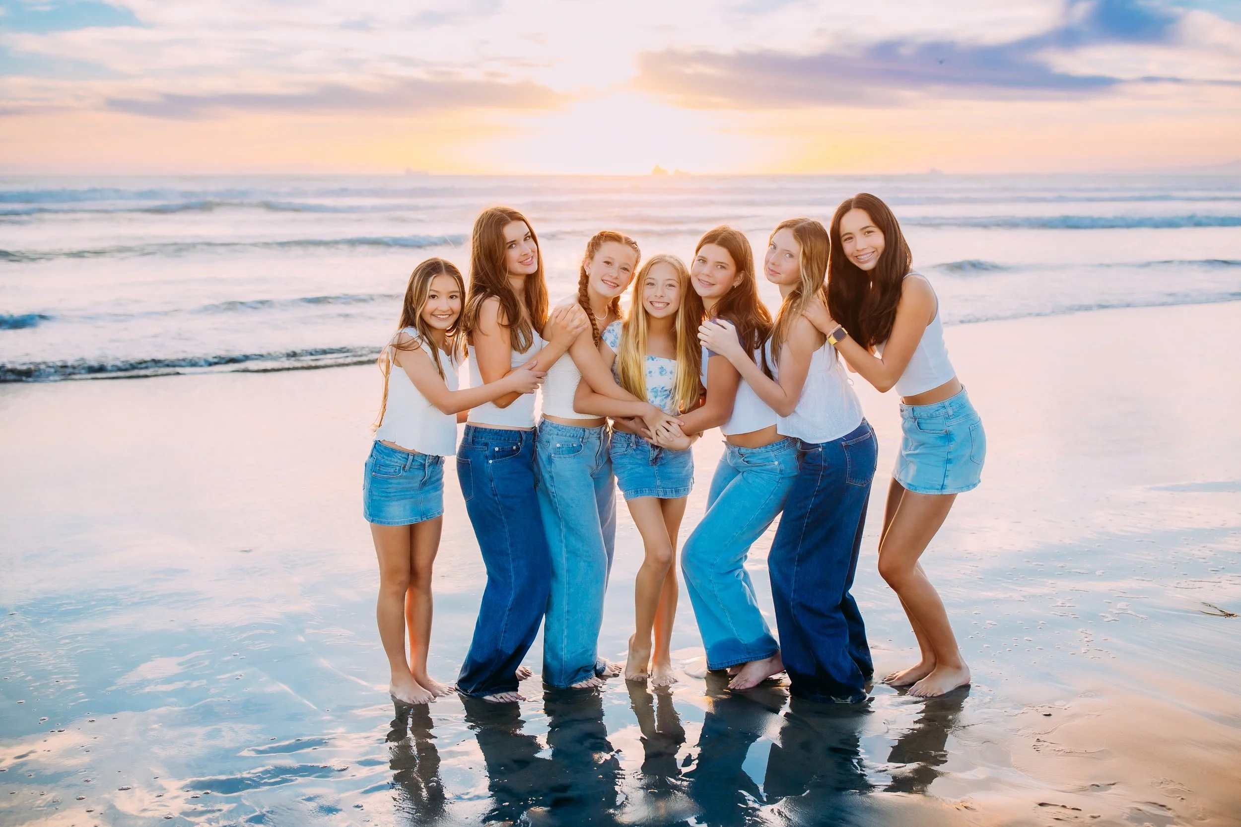 friends celebrating a 13th birthday with a sunset photoshoot in Newport Beach, California