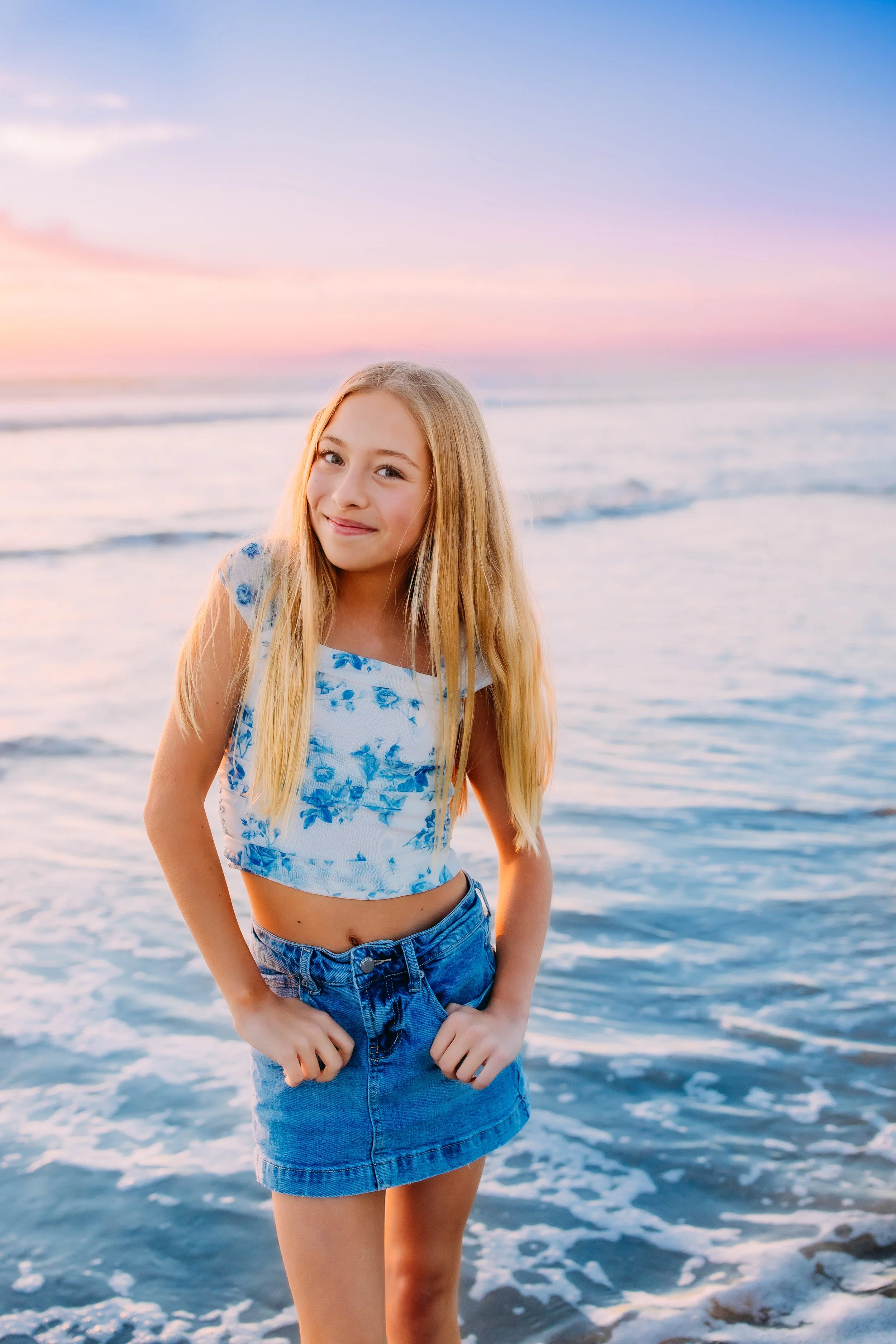 13-year-old birthday girl posing at sunset on Newport Beach, California