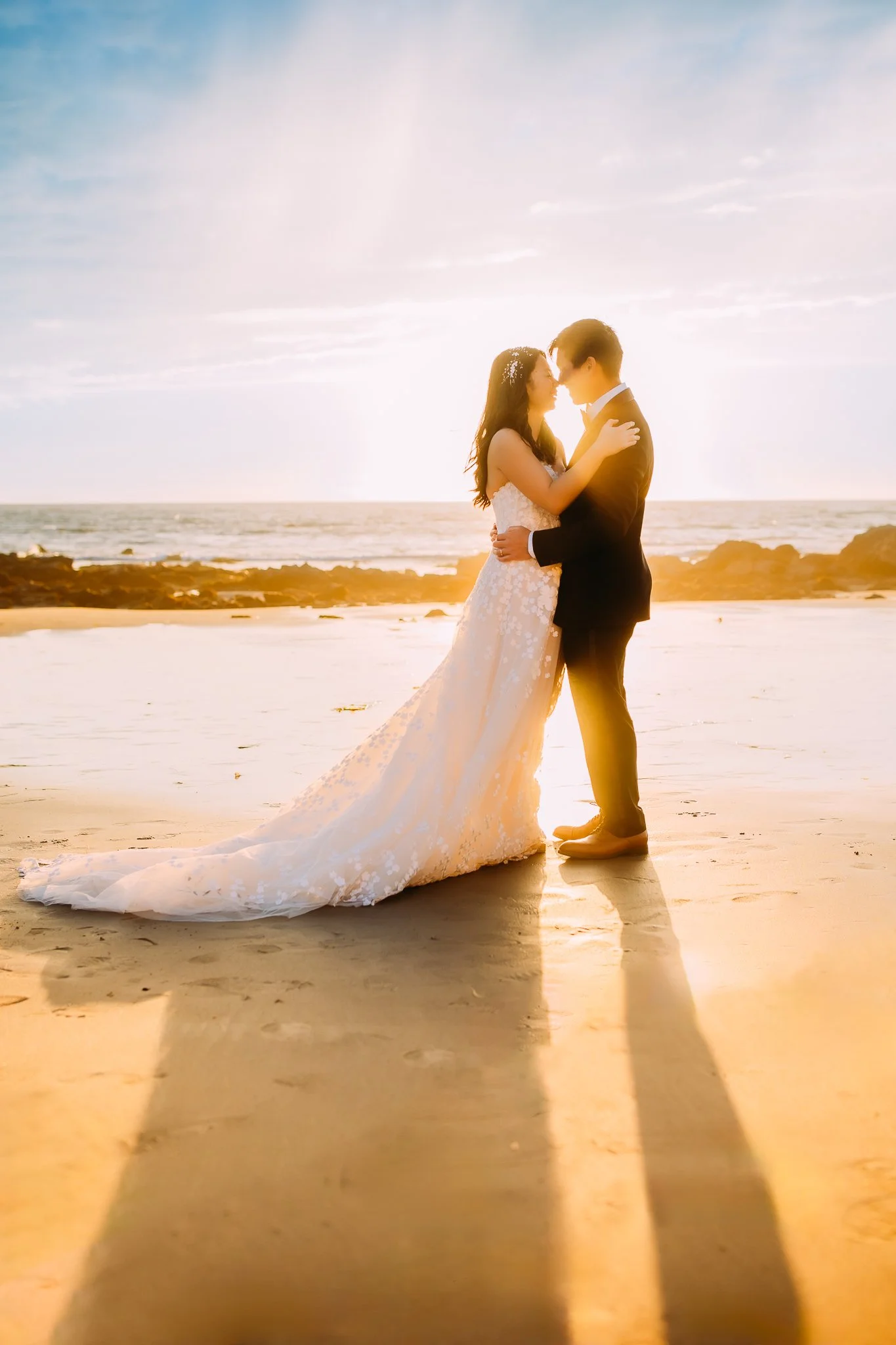 romantic couple shot at sunset during their bridal photos at sunset