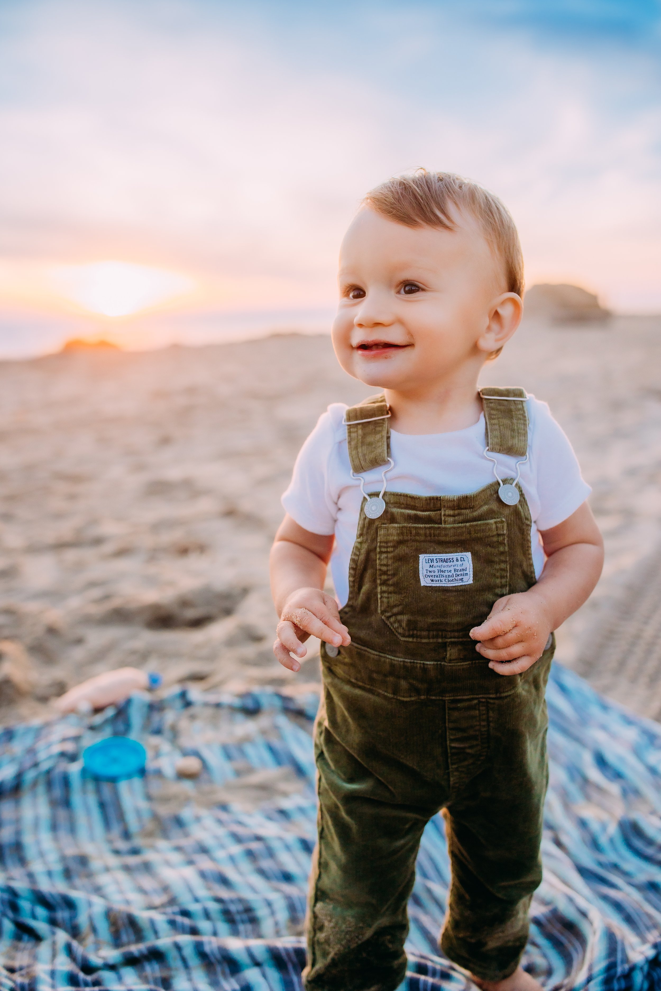 Newport Beach family photographer capturing a mother and son beach photoshoot.
