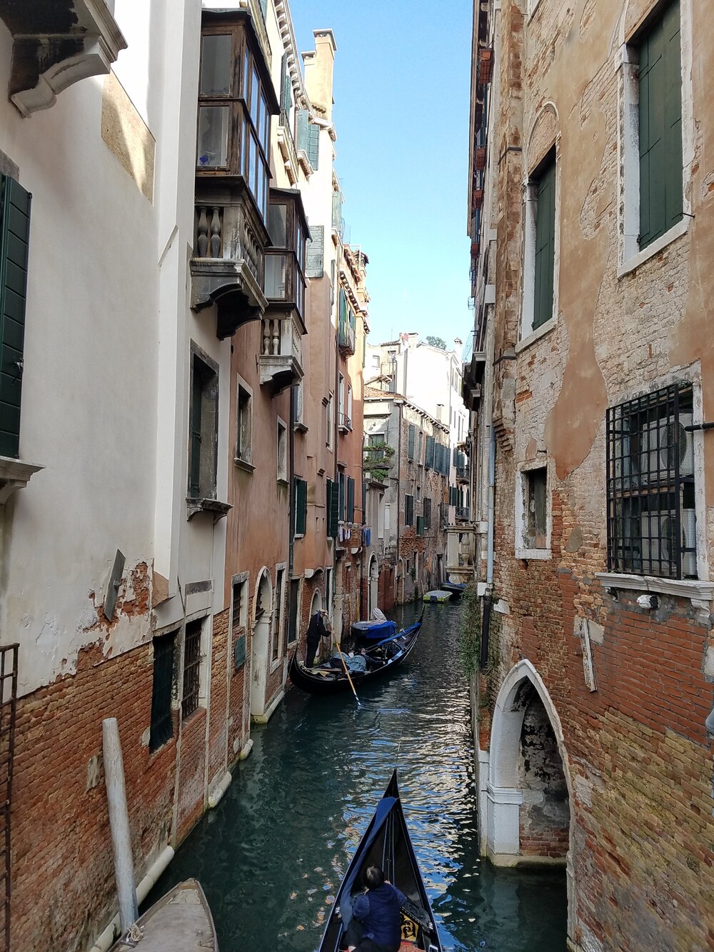 Quiet canal with gondolas