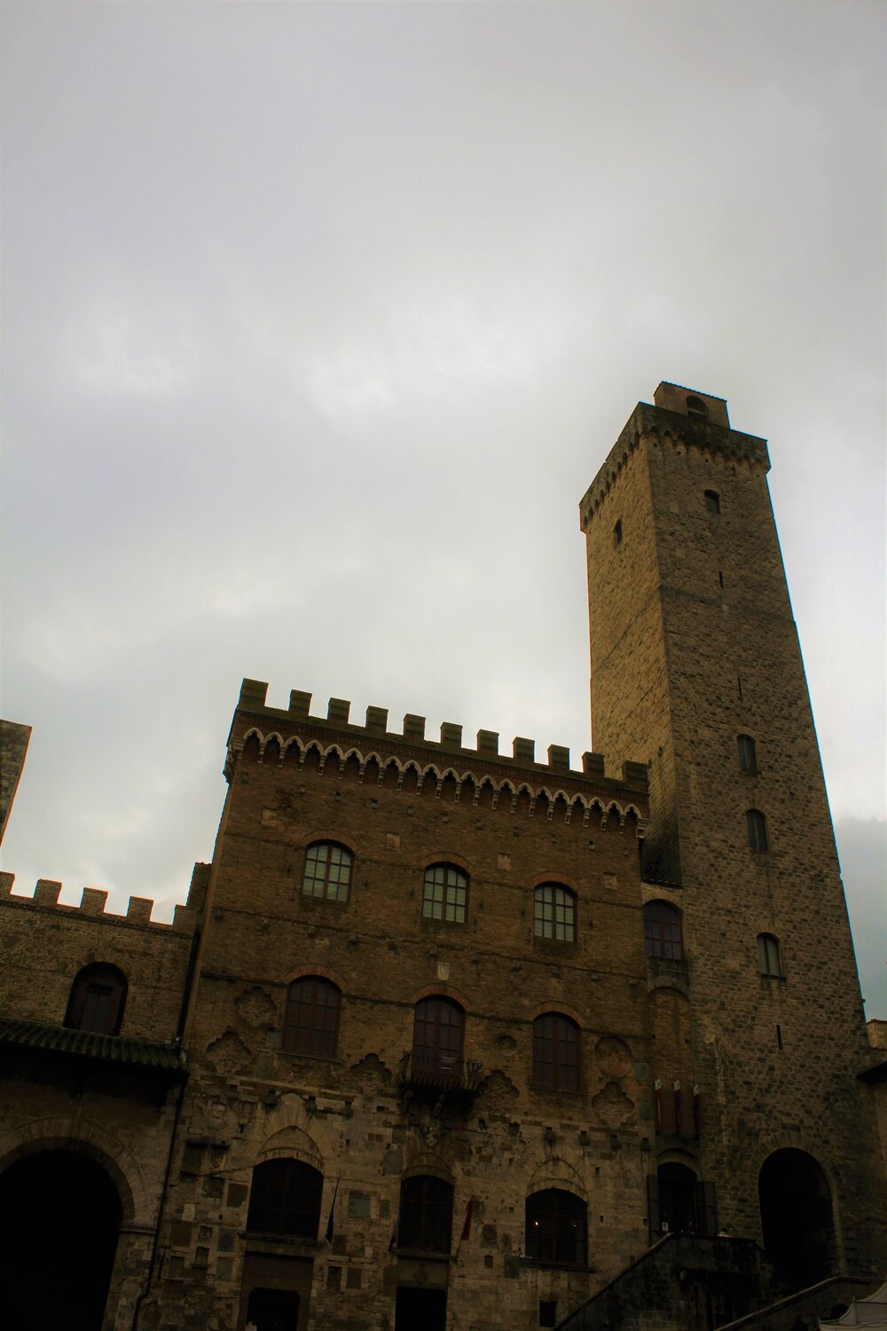 Looking up at the tower from Piazza della Cisterna