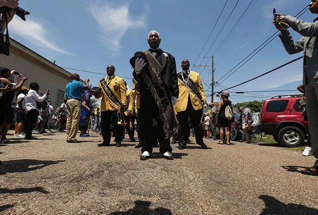 Grand Marshal Norman Boogie Thomas leads the Zulu Social Aid &amp; Pleasure Club as they escort former culinary legend Leah Chase through Treme with a traditional funeral dirge and second-line #leahchase #dookychase #secondline #treme #love #remember