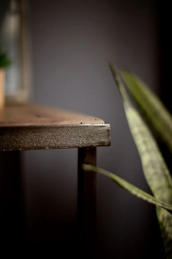  Iron detail on end table legs and framework 