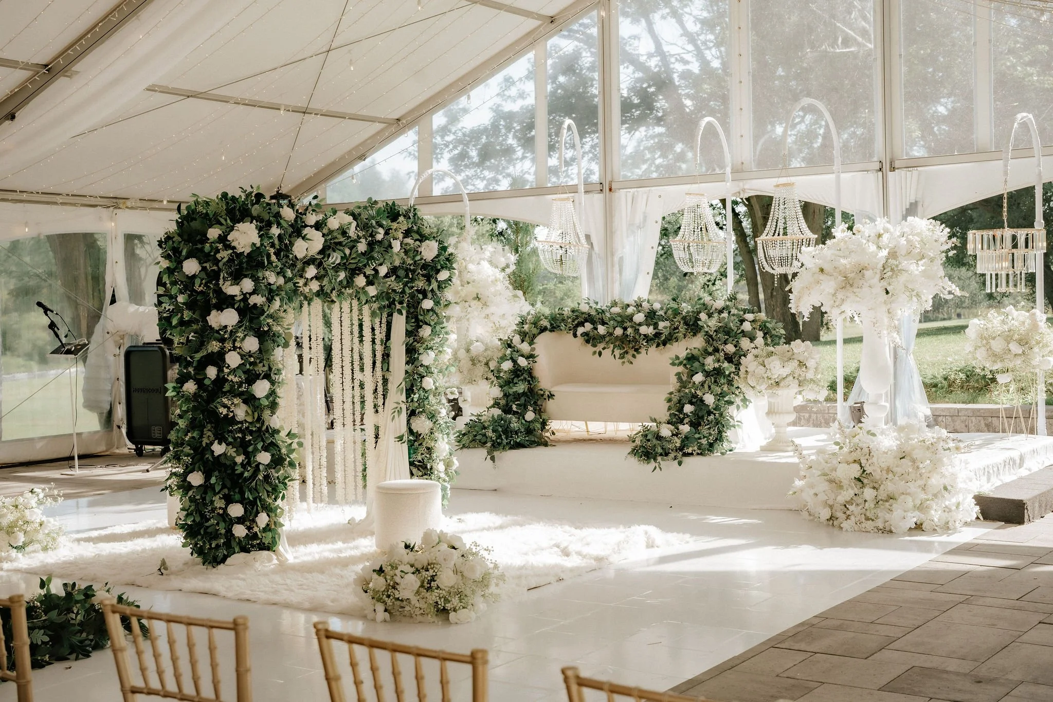 Muslim wedding reception photography Toronto – elegant white floral stage and wedding decor.