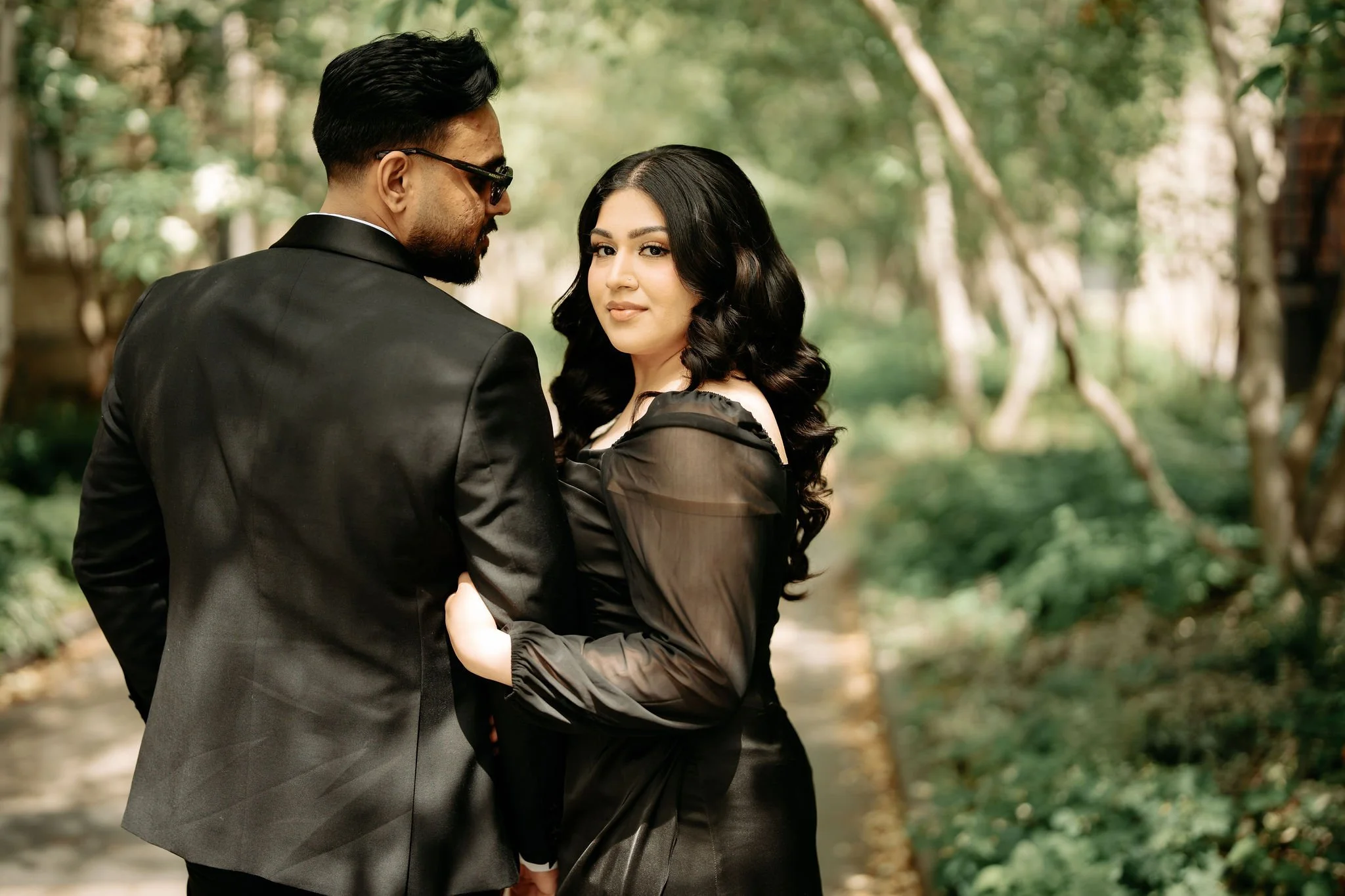 Toronto engagement photographer – cinematic black-outfit portraits of Muslim couple.