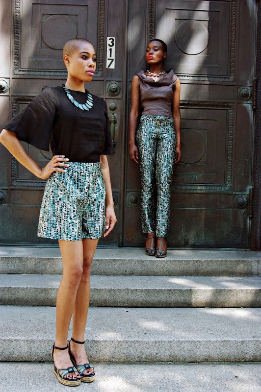 Image captured by Kwesi Abbensetts , clothes courtesy of Anitra Michelle and her Plutocracy line , styled by Jean S. Hall, and make-up by Apryl Rankin. Models: Folasade Adeoso & Liz Coicou