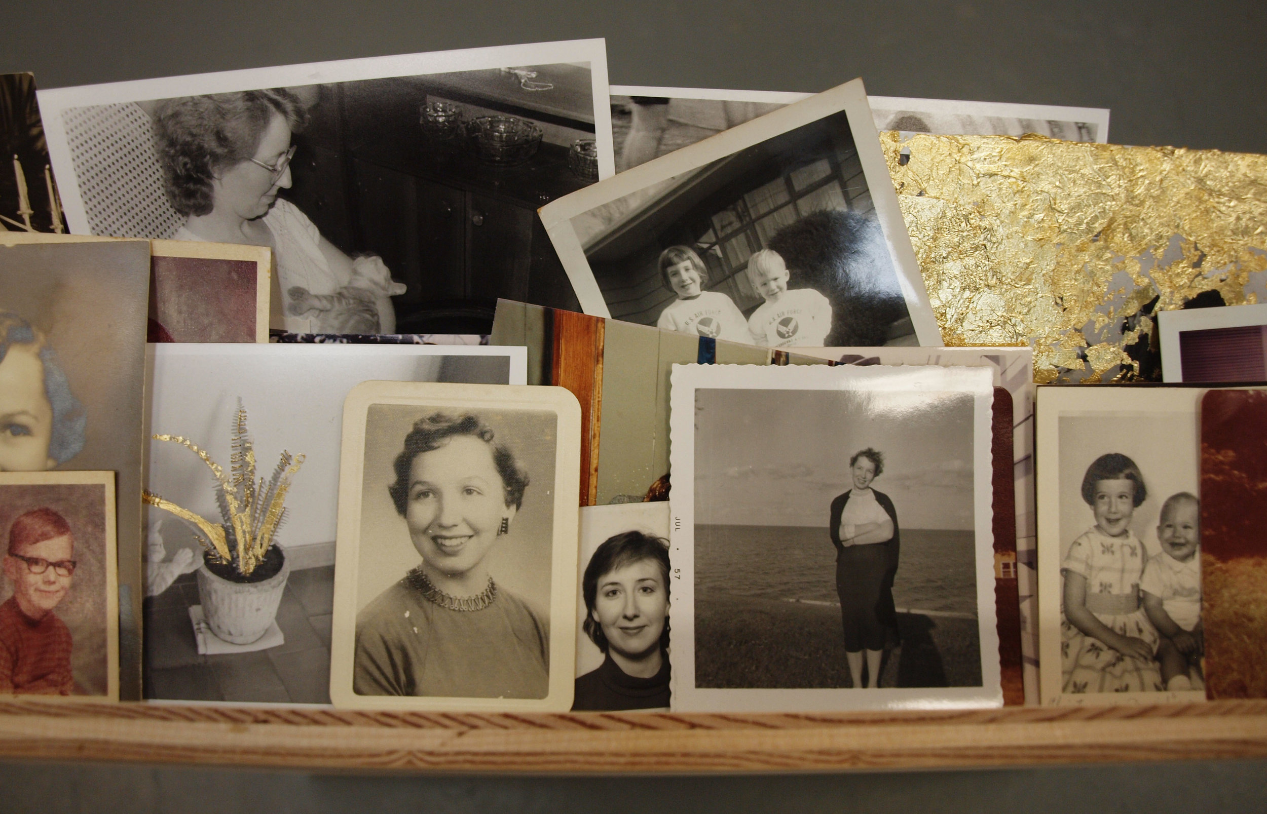  2014, found family photographs, silver gelatin prints, and gold leaf, various sizes 