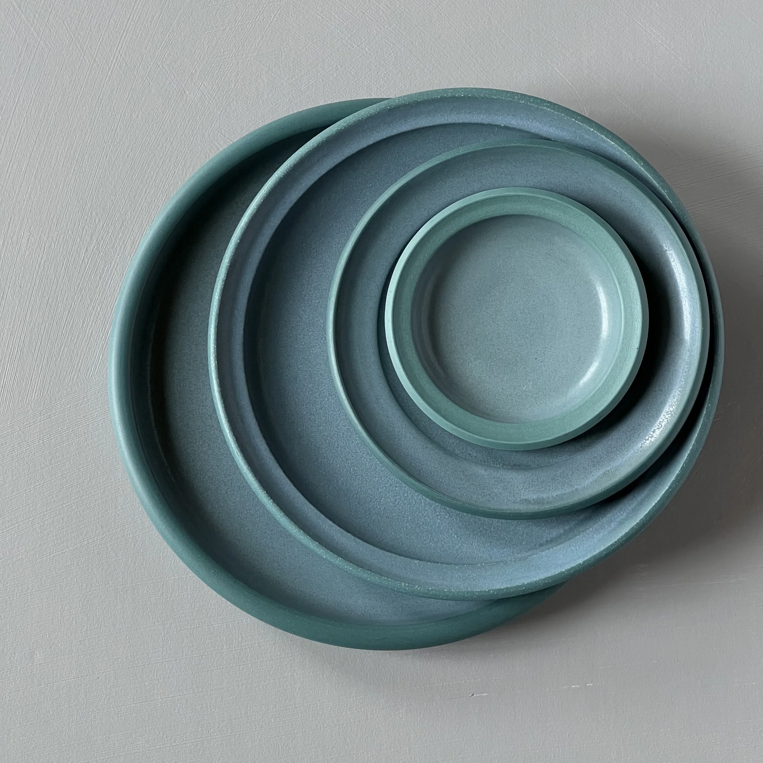 prop stylist's collection in teal / green-blue