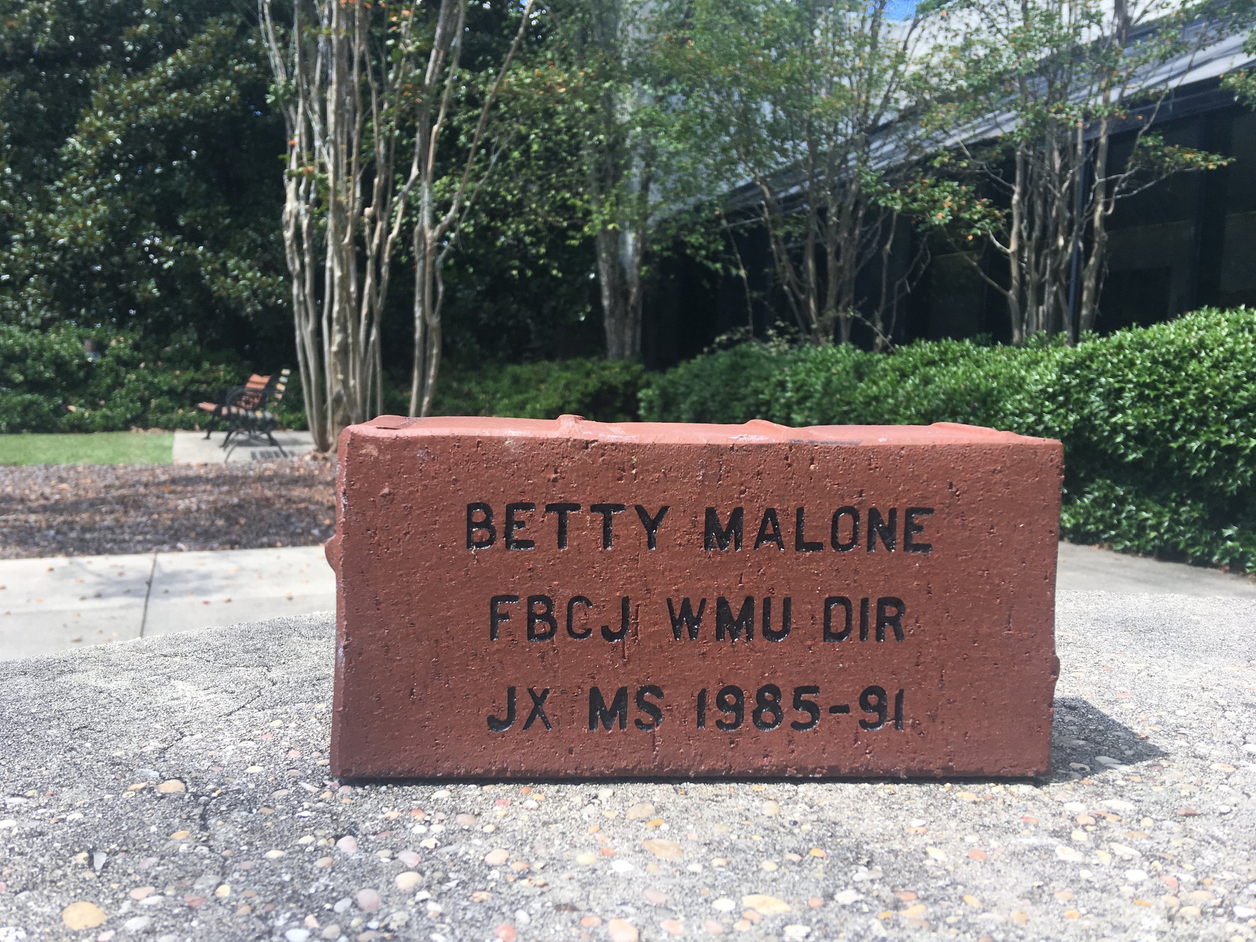 A brick was bought in memory of Betty Malone and her years of holding the missions banner.