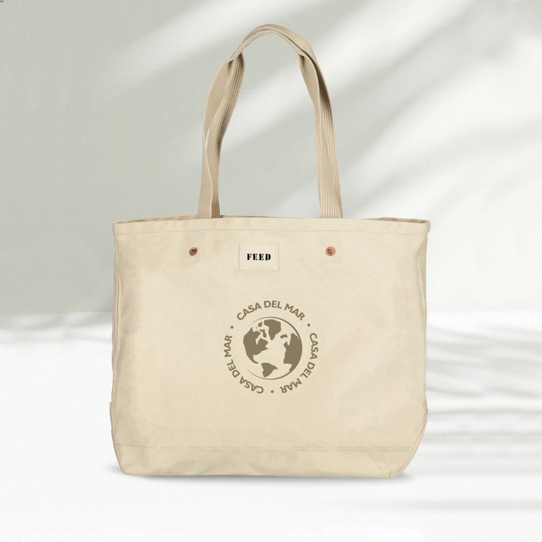 Transport your must-haves in style and impact change with our Organic Cotton Weekend Tote! Every purchase contributes to providing 5 school meals for children worldwide experiencing food insecurity. Perfect for Earth Day giveaways!
&middot;
&middot;
