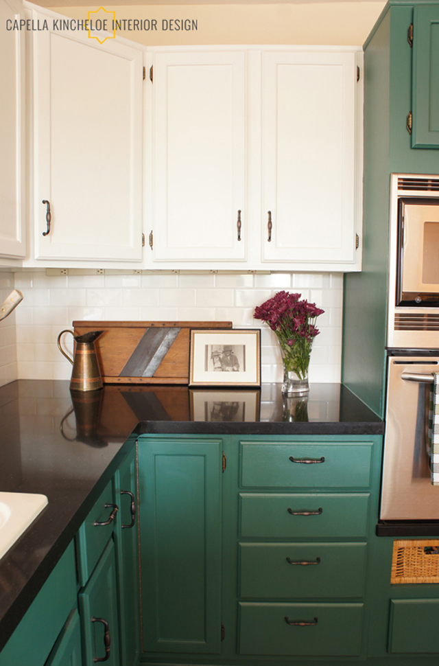 Green kitchen cabinets, Benjamin Moore Spinach, black quartz countertops