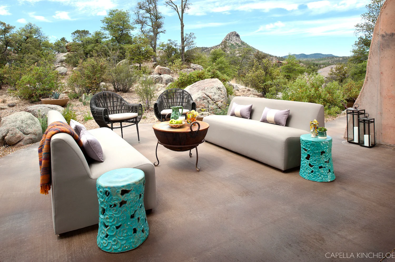 Exterior living room in Arizona. Flows with the interiors spaces via a Nana wall.