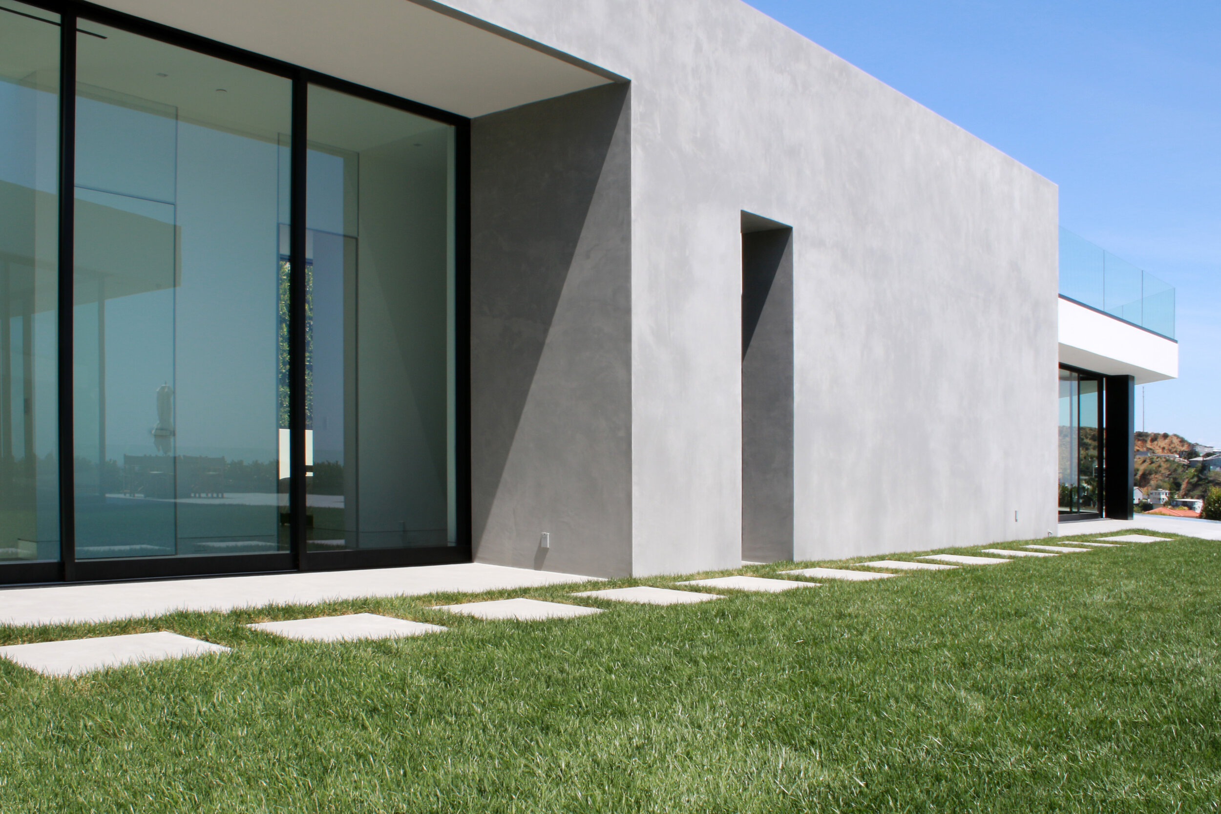 X-Bond Microcement Installed to house facade