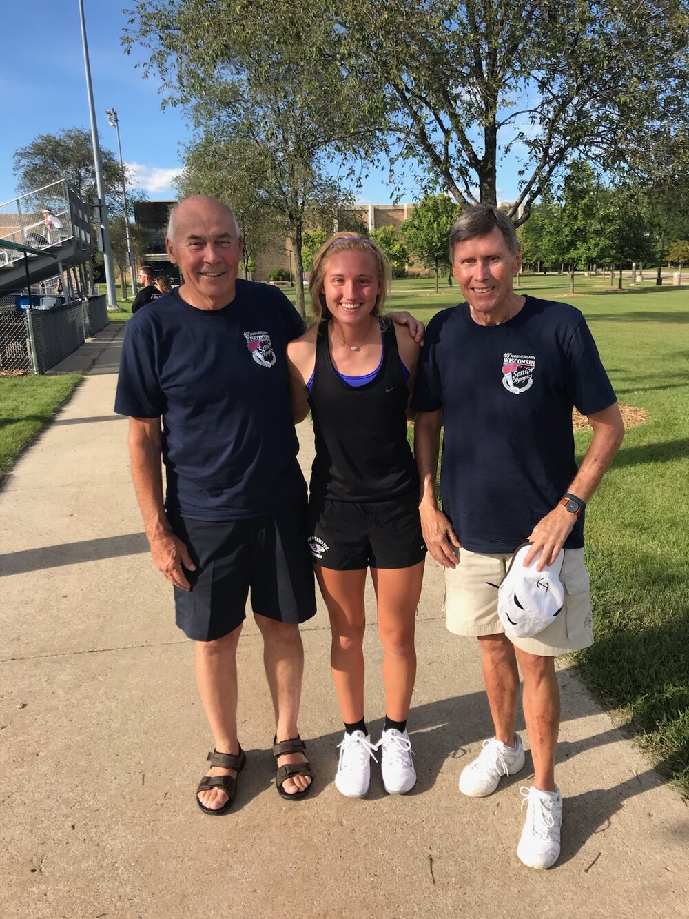 Madalyn Bigelow (FLAC jr. coach) after her UW Whitewater match