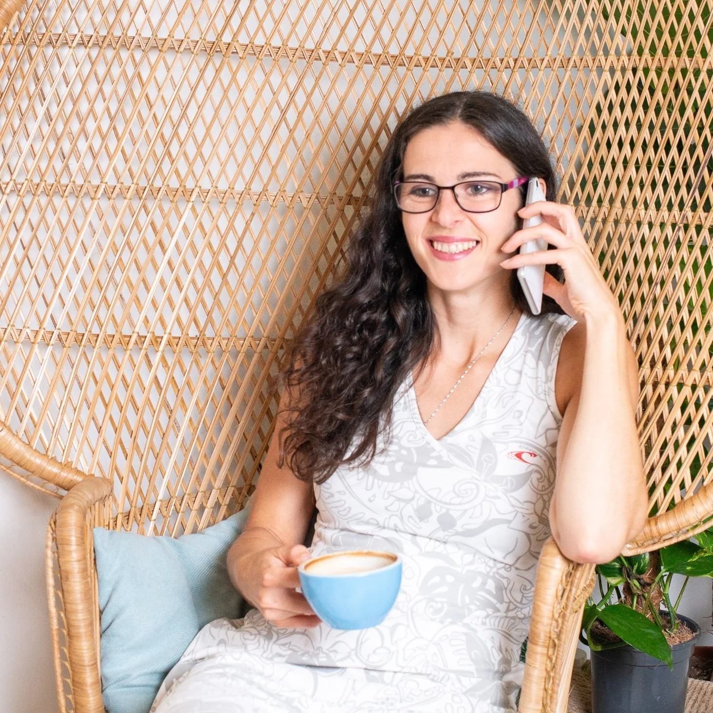 Photo of Elizabeth Biggs brand consultant on phone supporting a business client by advising content and social media up to date strategy