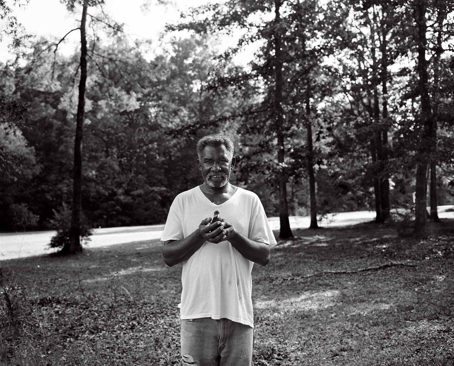 levon at home where he raises chicken, quails and rabbits.