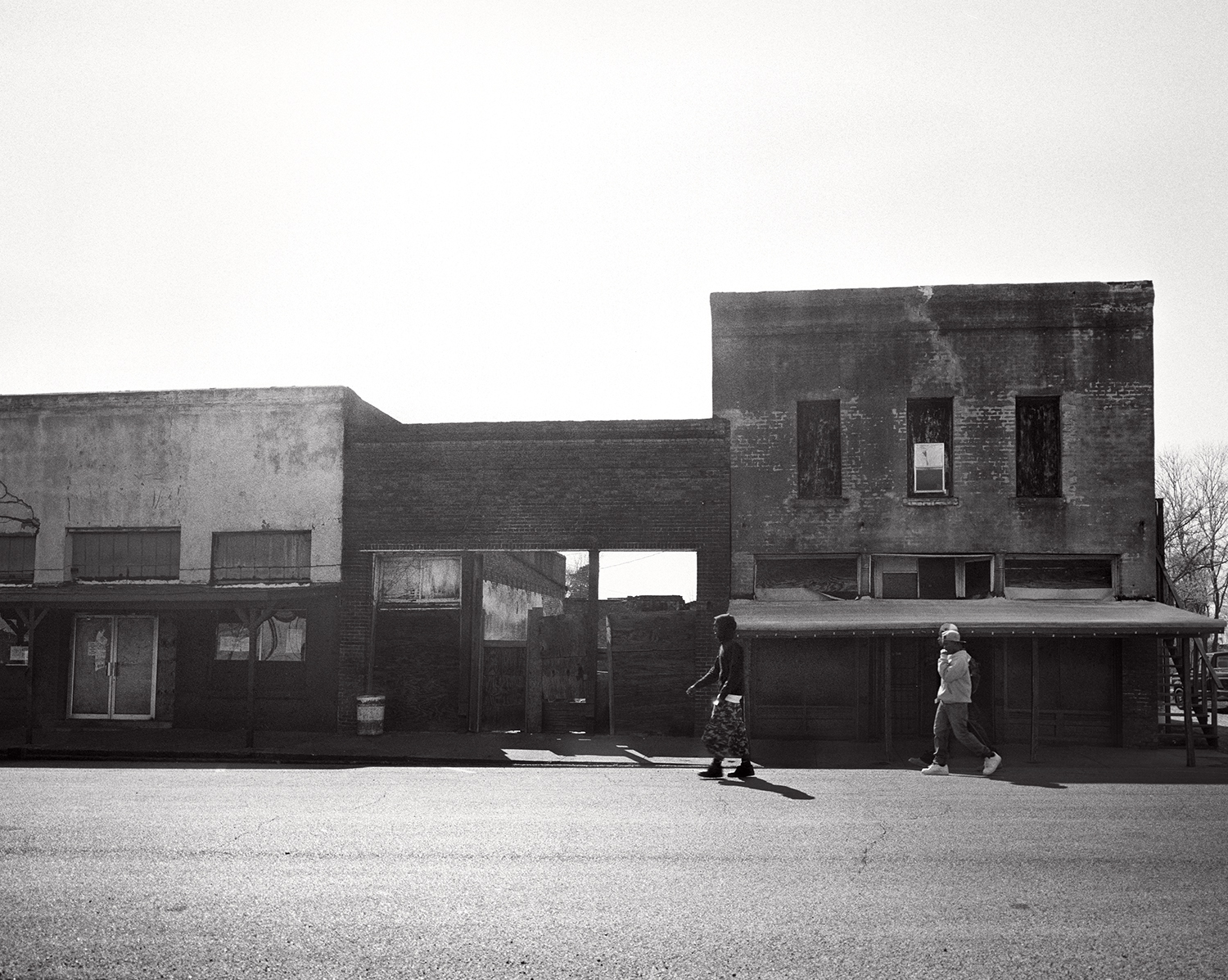 main street artesia, these two buildings house social clubs and nightclubs.