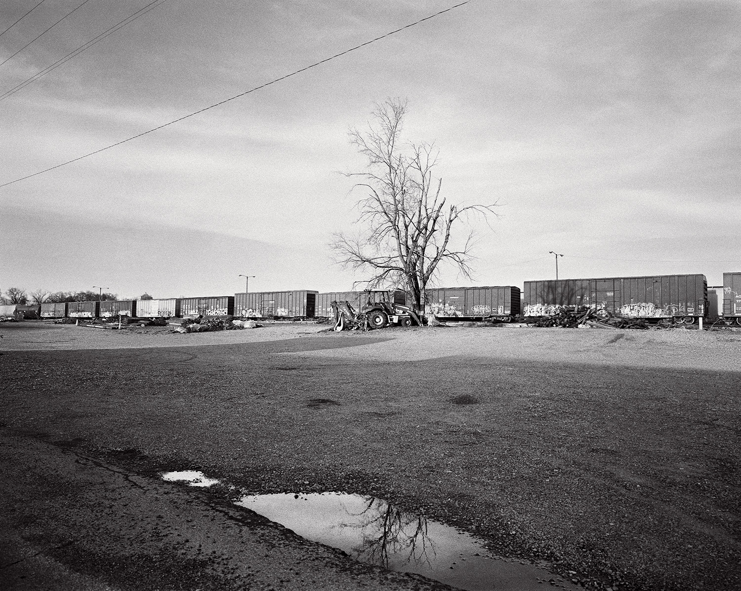 main street artesia, abandoned train across from the social clubs.