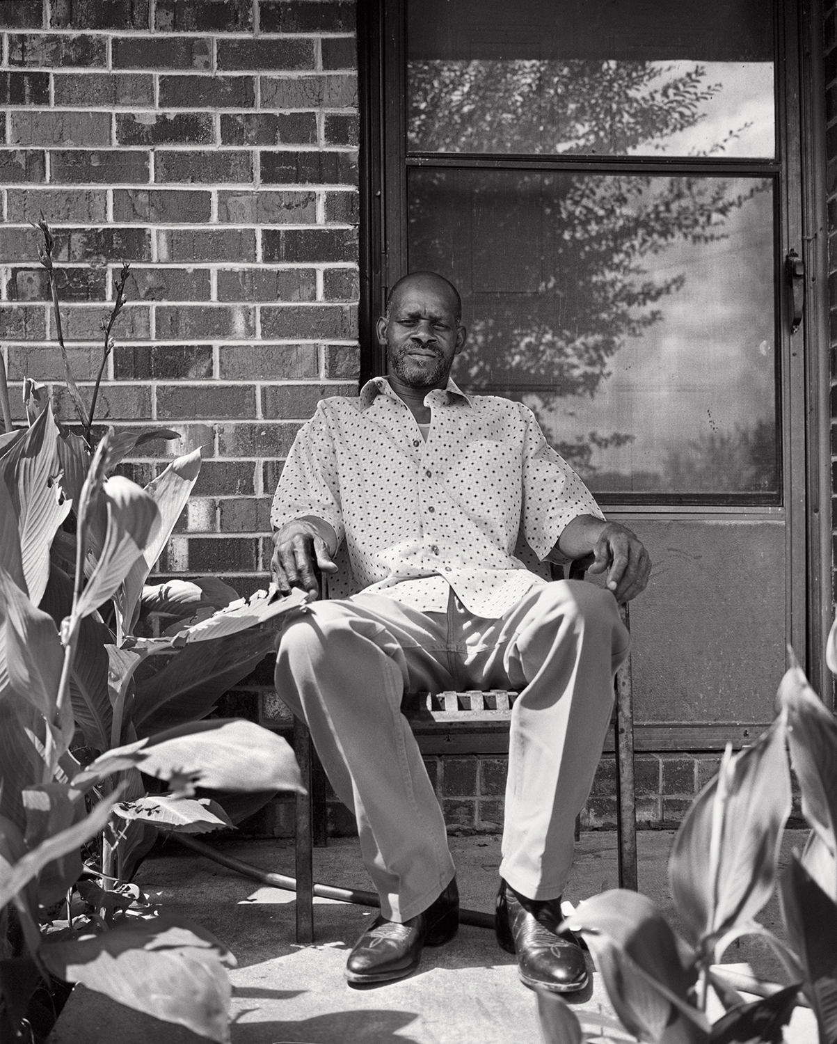 pem, kennedy's brother, outside his mother's house.