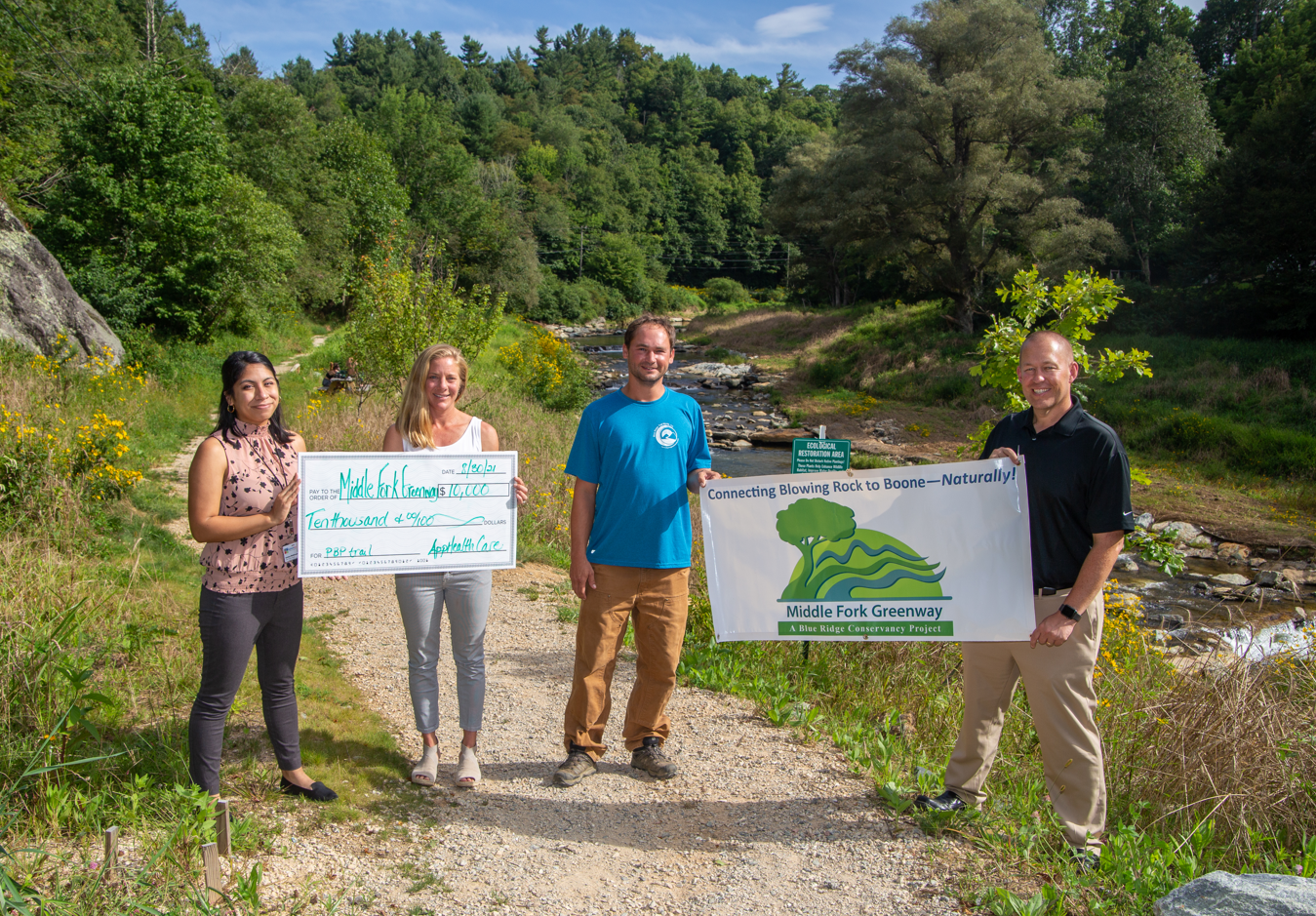 L-R: Keisha Maldonado (App Health Care), Zika Rea (ZAP Endurance), Clay Sulik (Blue Ridge Trail Works), John Welch (Watauga County Commissioner Chair)