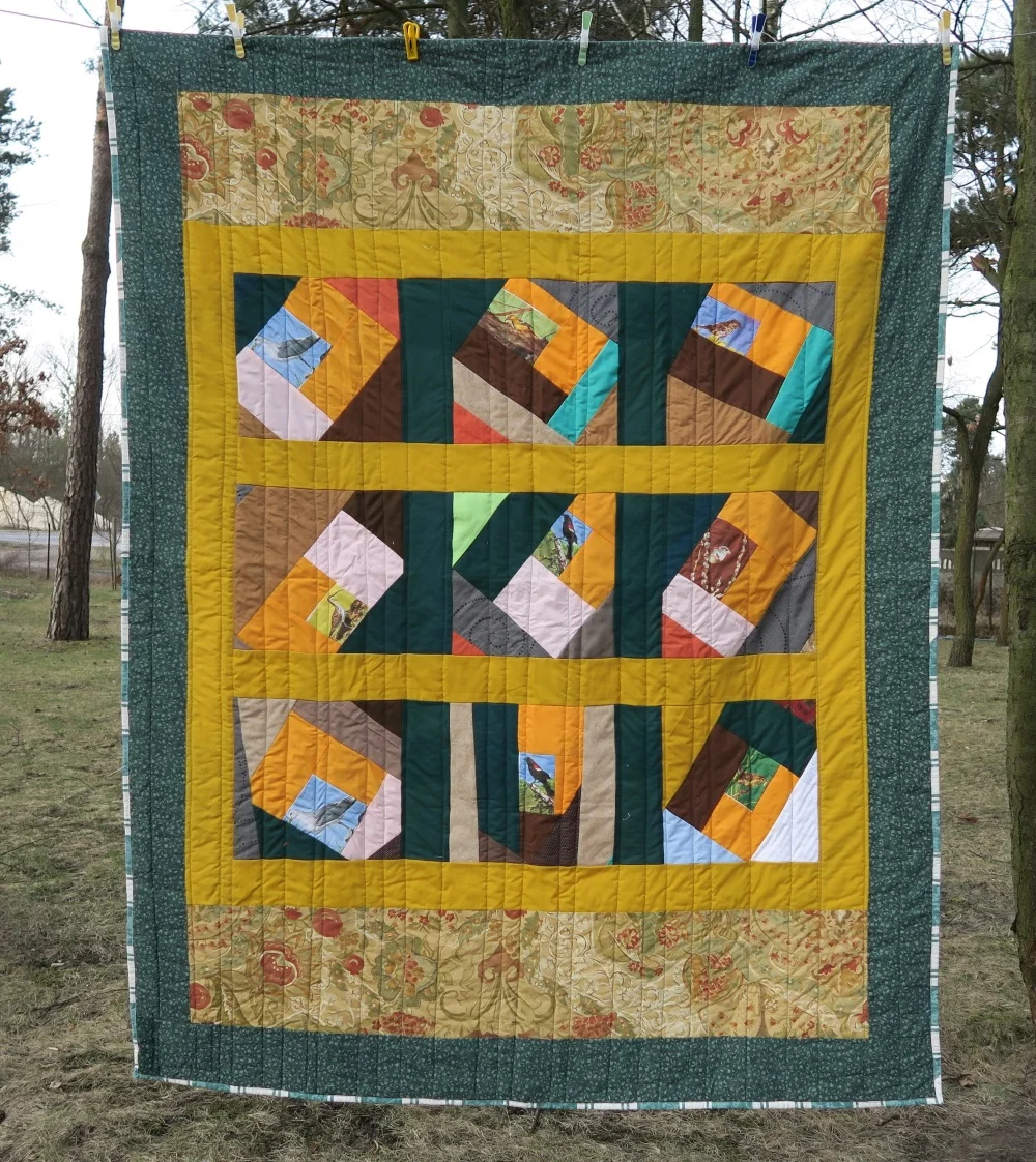 19 Crazy quilt top donated by a group in FL. The top was only a lap quilt size, but I find that I really need single or what I call European twin size. So, I added borders until it fit the size I needed.