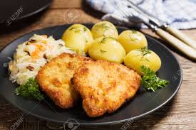 Typical breaded pork chops and potatoes. It's delicious, BTW!
