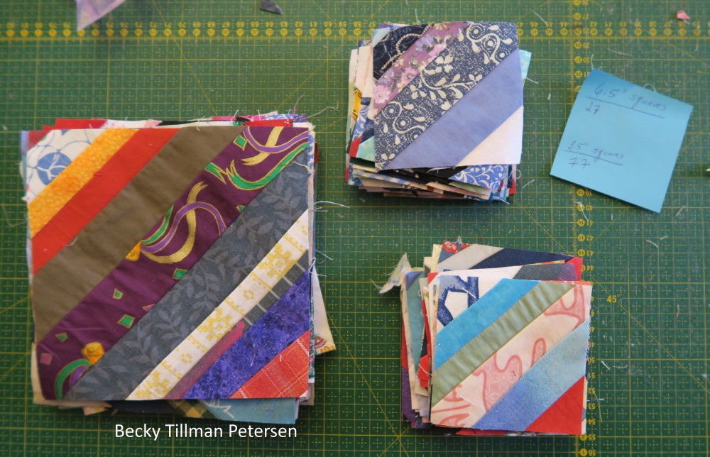 These are just my pictures of the strings blocks I've completed. Crumbs are going even more slowly. These are 6.5" and 3.5" blocks. I have 27 of the 6.5" and 77 of the smaller ones.