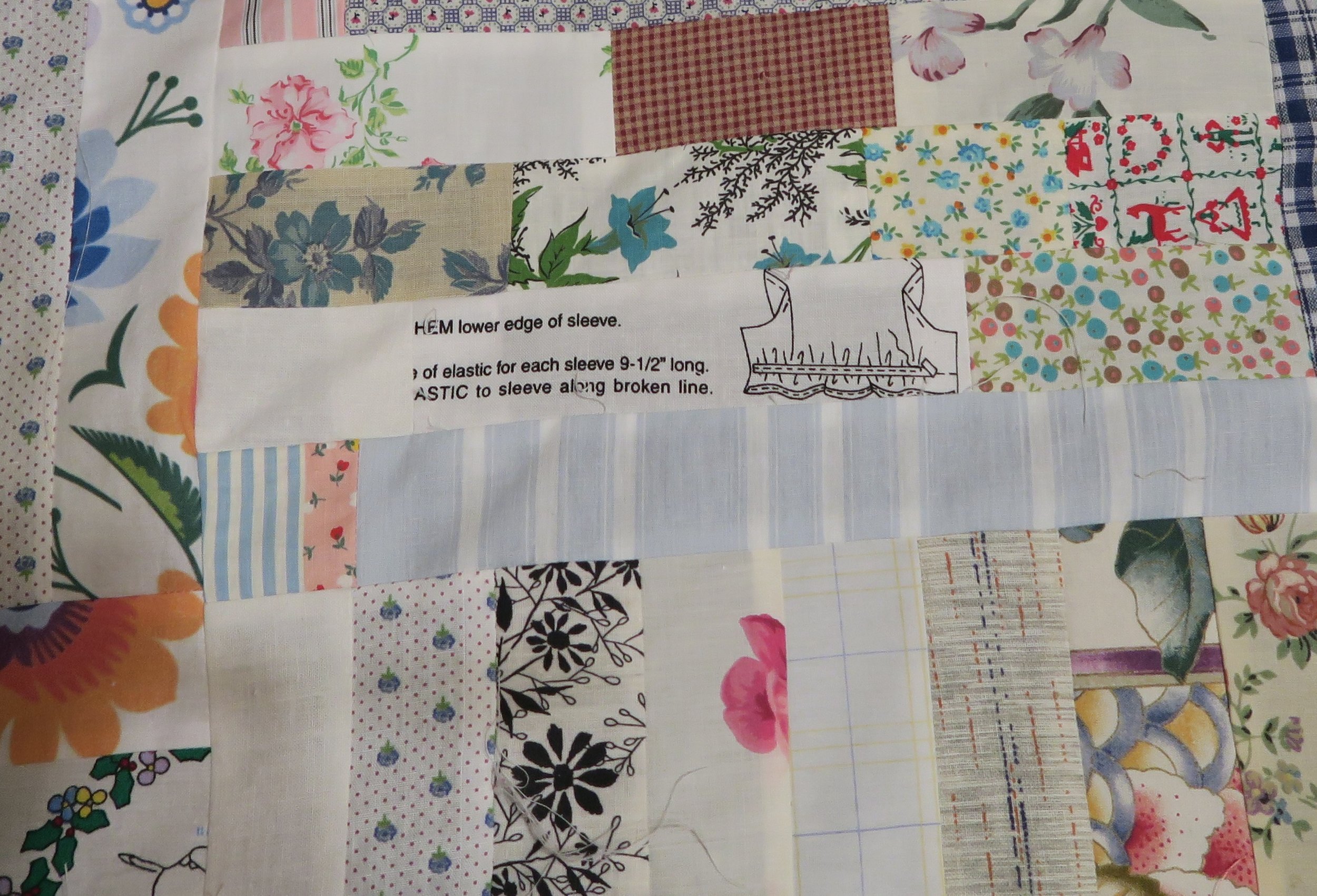 These are the kinds of things I like to put in this kind of quilt. These were leftover from various low volume things I had made. I tried to stick to pretty much white or off white backgrounds - and keep the print to minimum, though at times I didn't do that very well.