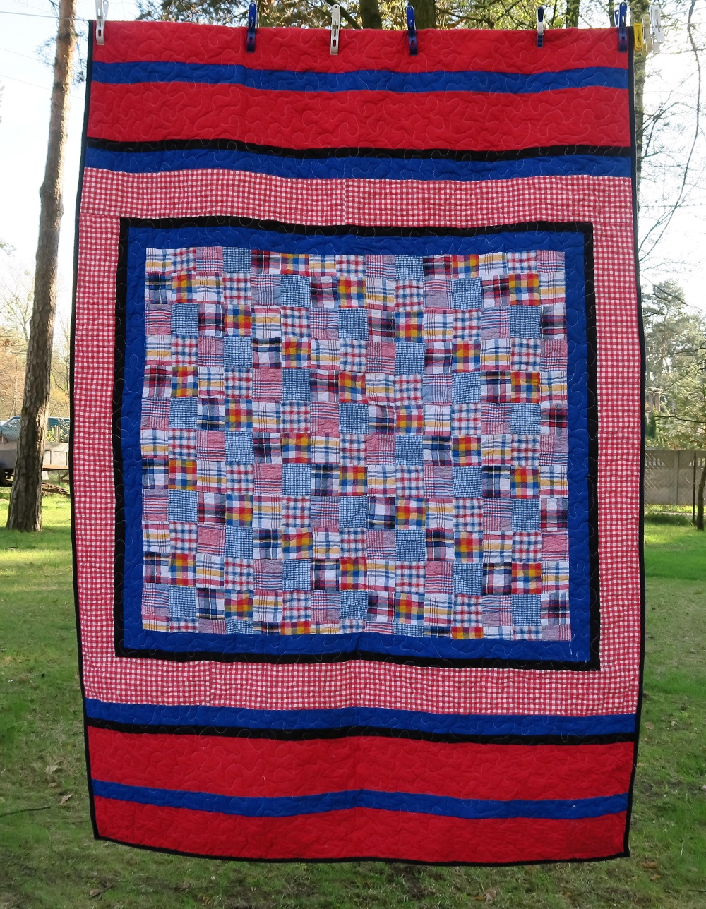 23. I found this patchwork in my fabric - the center piece. I added borders, and figured it would be great for a guy/man. (Now watch a lady choose it!) I'm always looking out for good guy ideas.