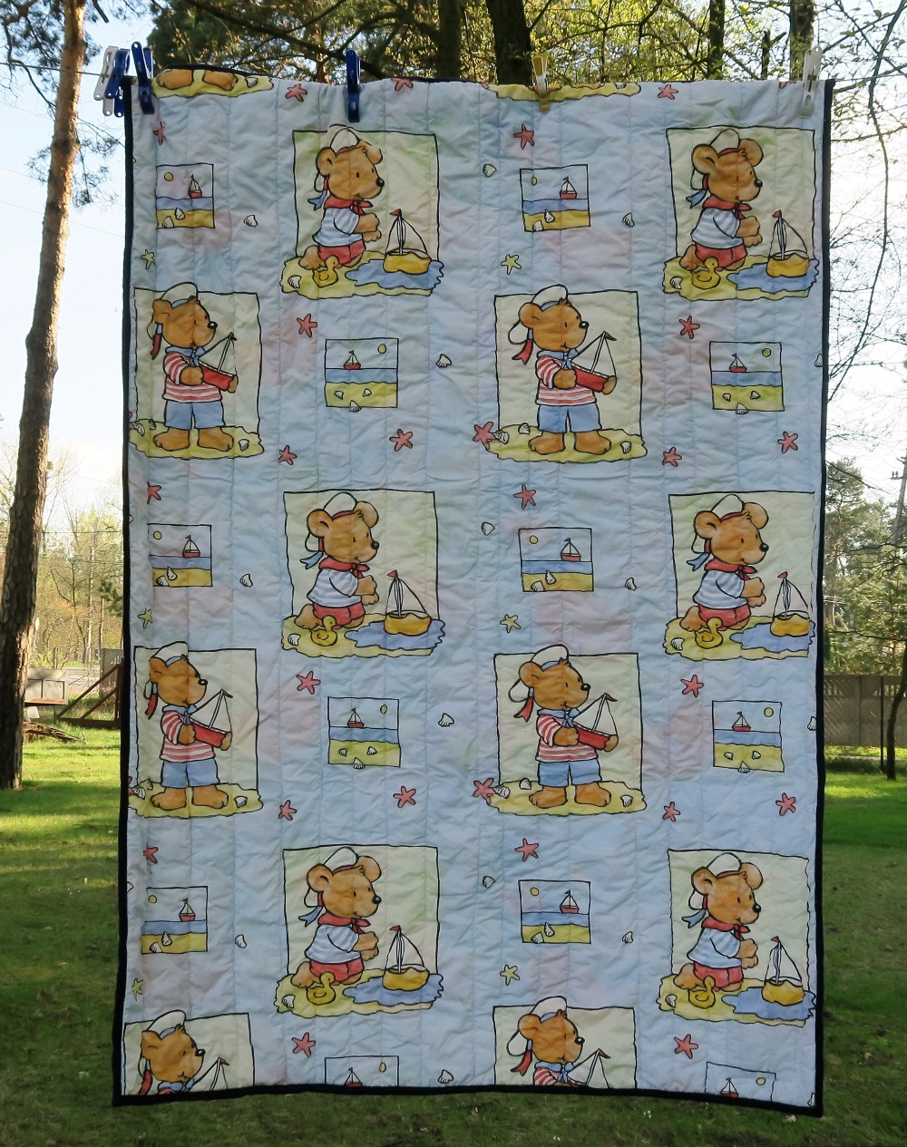 25. Simply quilted a piece of fabric because the print was too large to cut up. It's not quite as large as my normal single because I figured a mom will choose it for her 3 year old - and they aren't very big.