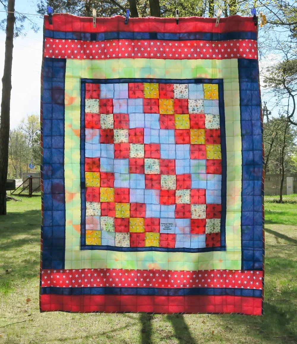 34 - Center of top donated by a friend in AZ. I added borders to make it a European twin size.